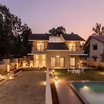 Stayvista\'S Enchanting Haven - Modern Interiors, Sprawling Lawn With Gazebo, Swimming Pool, Indoor Games