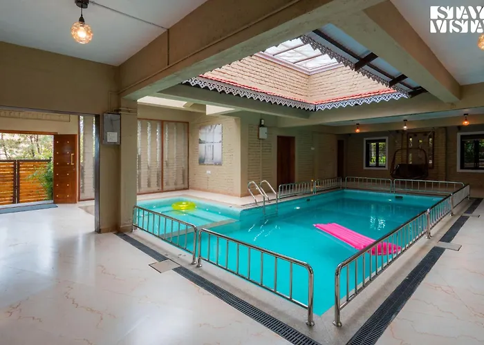 Otonia By Stayvista With Indoor Swimming Pool, Modern Interiors & A Mix Of Indoor & Outdoor Games