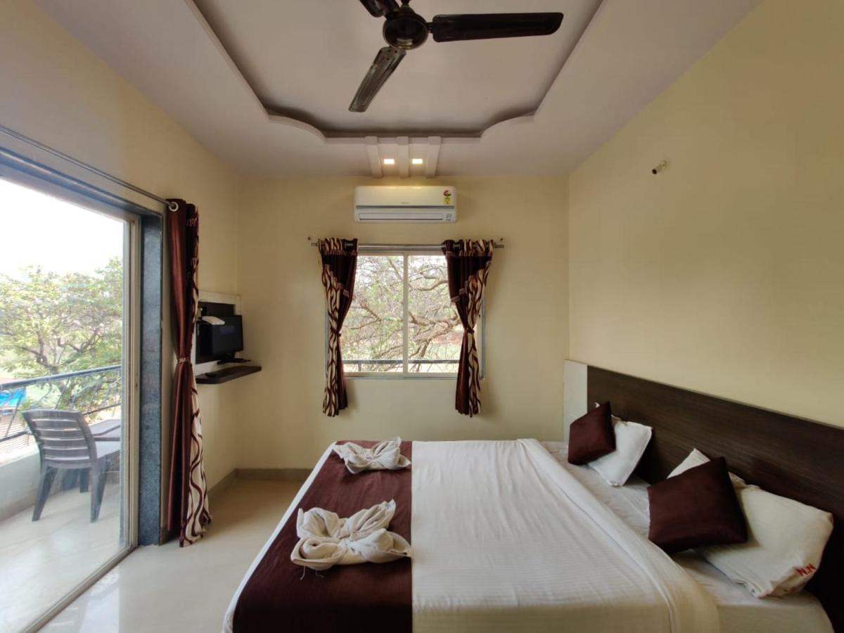 Nisarg Lodge *