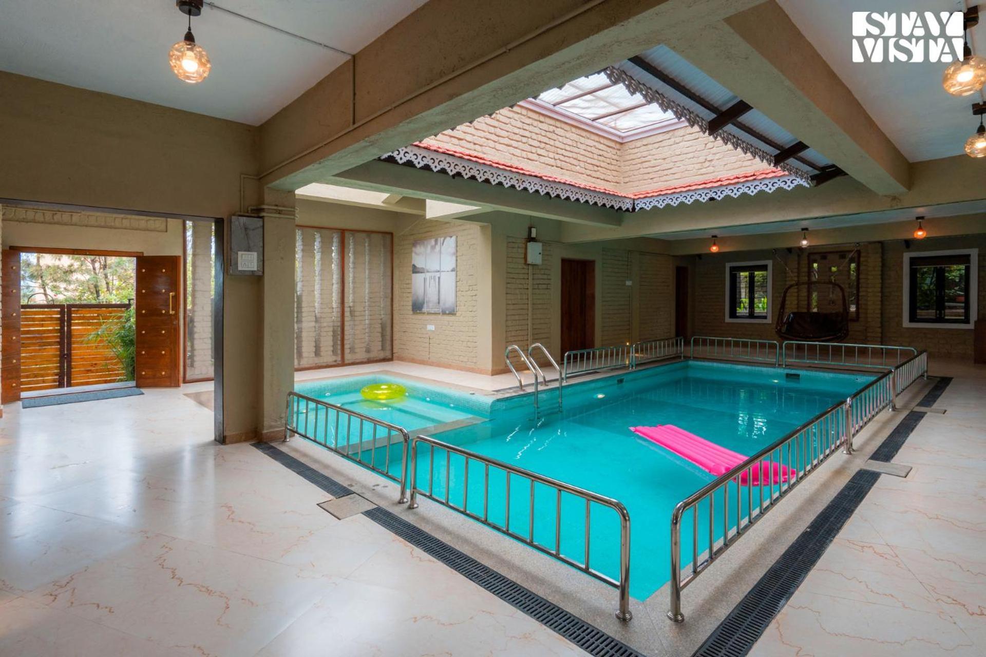 Otonia By Stayvista With Indoor Swimming Pool, Modern Interiors & A Mix Of Indoor & Outdoor Games *