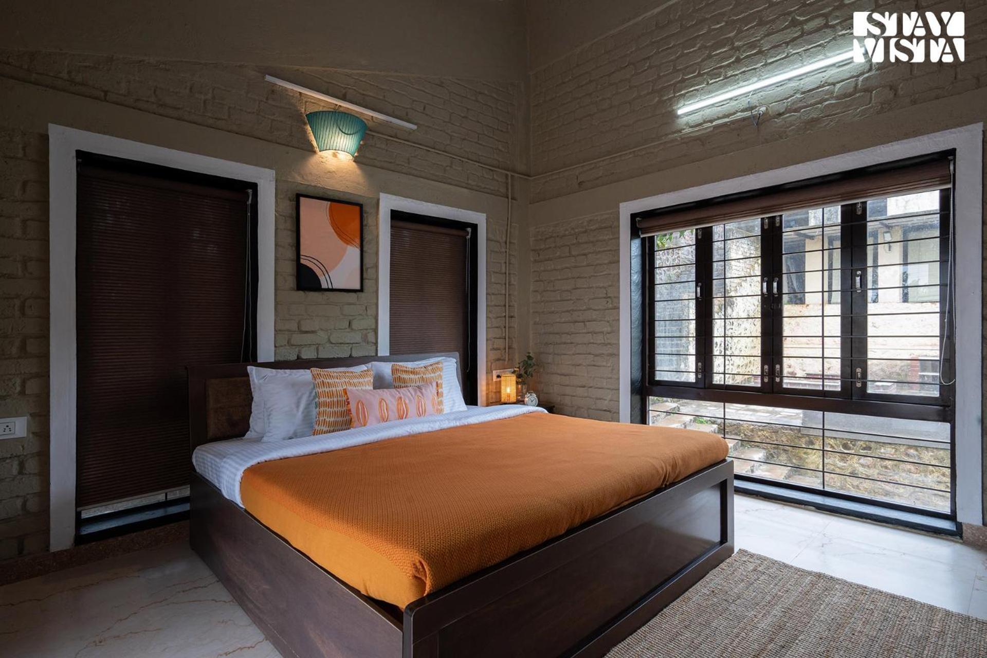 Otonia By Stayvista With Indoor Swimming Pool, Modern Interiors & A Mix Of Indoor & Outdoor Games *