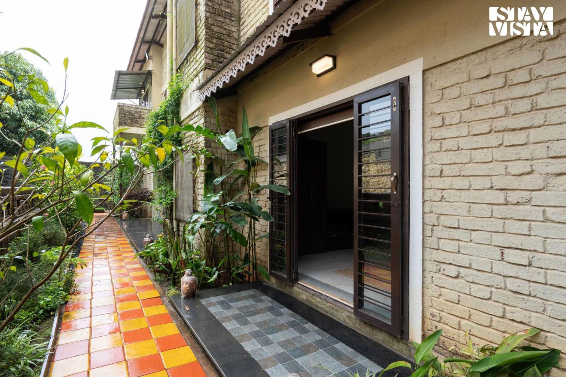 Otonia By Stayvista With Indoor Swimming Pool, Modern Interiors & A Mix Of Indoor & Outdoor Games