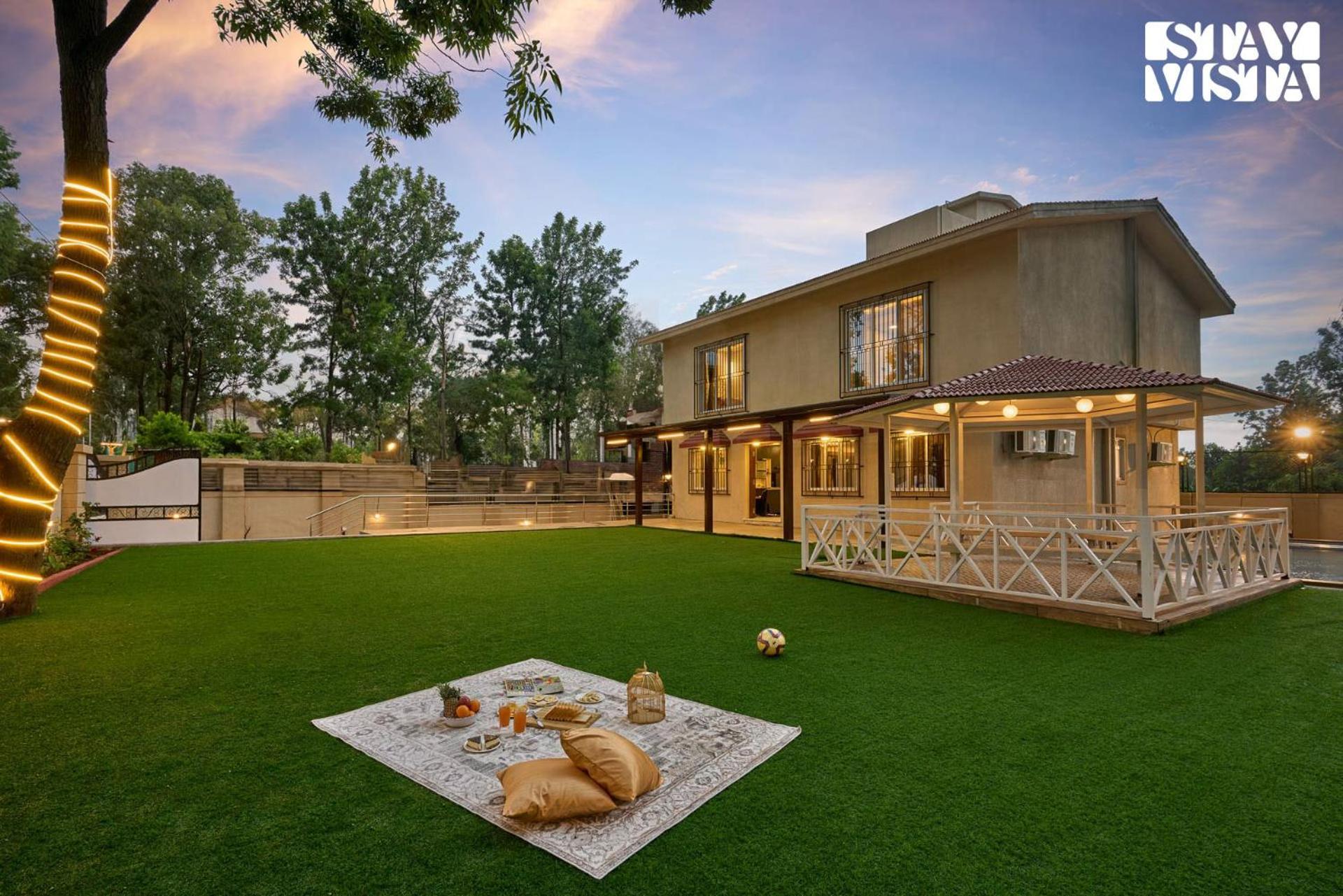 Elegant Escapes With Swimming Pool, Lawn & Bonfire At By Stayvista